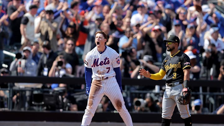 Mar 26, 2026; New York City, New York, USA; New York Mets designated hitter Brett Baty (7) reacts after hitting an RBI triple against the Pittsburgh Pirates during the first inning at Citi Field. Mandatory Credit: Brad Penner-Imagn Images