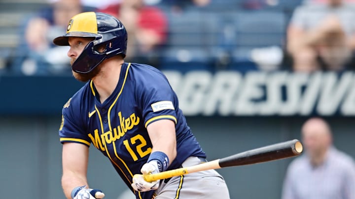Milwaukee Brewers first baseman Rhys Hoskins (12) hits an RBI single during the ninth inning against the Cleveland Guardians at Progressive Field on May 14.
