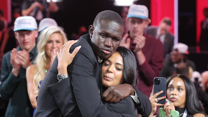 Khaman Maluach celebrates after being selected as the tenth pick by the Houston Rockets.