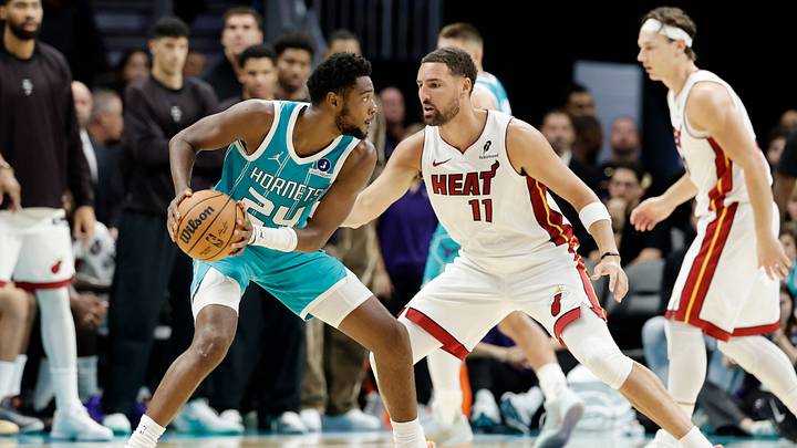 Oct 24, 2026; Charlotte, North Carolina, USA; Charlotte Hornets forward Brandon Miller (24) is guarded by Miami Heat guard Klay Thompson (11) during the fourth quarter at Spectrum Center. Mandatory Credit: Brian Westerholt-Imagn Images Oct 24, 2026; Charlotte, North Carolina, USA; Charlotte Hornets forward Brandon Miller (24) is guarded by Miami Heat guard Klay Thompson (11) during the fourth quarter at Spectrum Center. Mandatory Credit: Brian Westerholt-Imagn Images