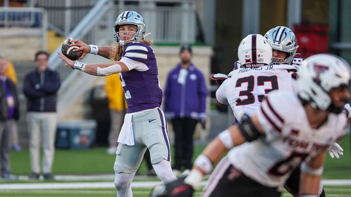 Nov 1, 2025; Manhattan, Kansas, USA; Kansas State Wildcats quarterback Avery Johnson (2) looks to throw a pass during the fourth quarter against the Texas Tech Red Raiders at Bill Snyder Family Football Stadium. Mandatory Credit: Scott Sewell-Imagn Images Nov 1, 2025; Manhattan, Kansas, USA; Kansas State Wildcats quarterback Avery Johnson (2) looks to throw a pass during the fourth quarter against the Texas Tech Red Raiders at Bill Snyder Family Football Stadium. Mandatory Credit: Scott Sewell-Imagn Images