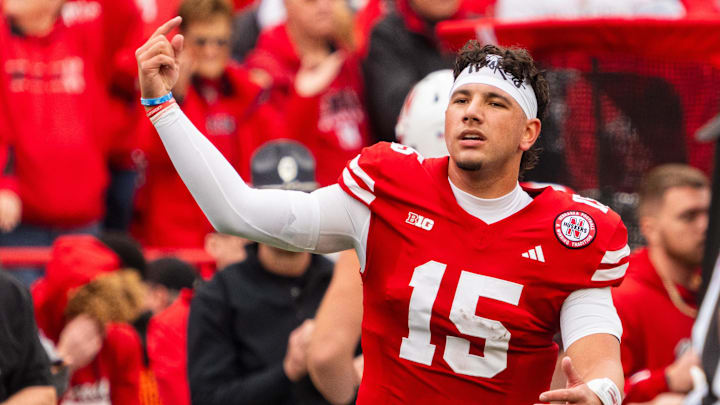 Nov 2, 2024; Lincoln, Nebraska, USA; Nebraska Cornhuskers quarterback Dylan Raiola (15) celebrates after a touchdown against the UCLA Bruins during the second quarter at Memorial Stadium. Mandatory Credit: Dylan Widger-Imagn Images