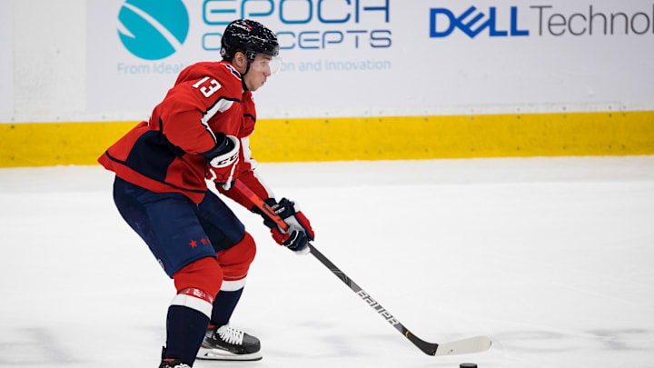 Mar 28, 2021; Washington, District of Columbia, USA; Washington Capitals left wing Jakub Vrana (13) skates with the puck against the New York Rangers during the second period at Capital One Arena. Mandatory Credit: Scott Taetsch-Imagn Images