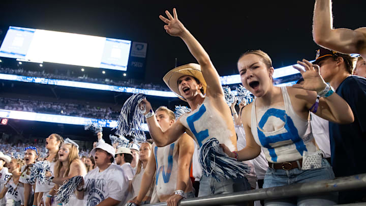 Penn State fans cheer on the Nittany Lions in the fourth quarter of a Big Ten football game against Illinois.