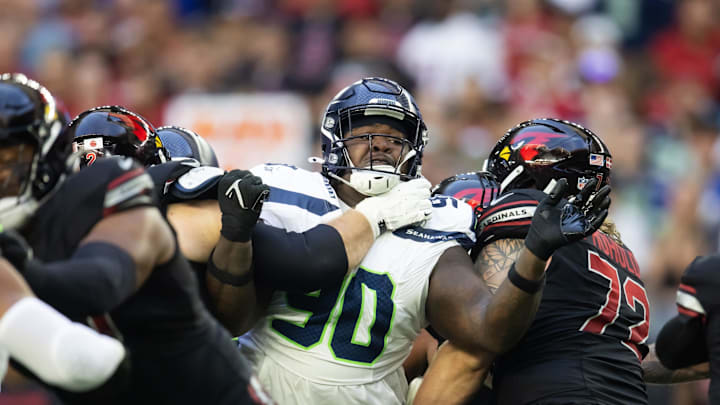 Dec 8, 2024; Glendale, Arizona, USA; Seattle Seahawks defensive tackle Jarran Reed (90) against the Arizona Cardinals at State Farm Stadium.