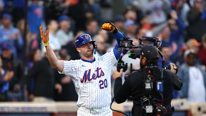 Oct 18, 2024; New York City, New York, USA; New York Mets first baseman Pete Alonso (20) celebrates his three run home run during the first inning against the Los Angeles Dodgers during game five of the NLCS for the 2024 MLB playoffs at Citi Field. Mandatory Credit: Vincent Carchietta-Imagn Images