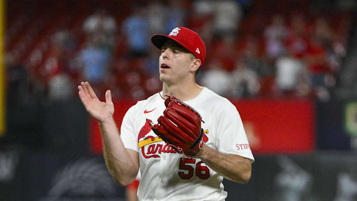 Jul 24, 2025; St. Louis, Missouri, USA;  St. Louis Cardinals relief pitcher Ryan Helsley (56) celebrates after the Cardinals defeated the San Diego Padres at Busch Stadium. Mandatory Credit: Jeff Curry-Imagn Images