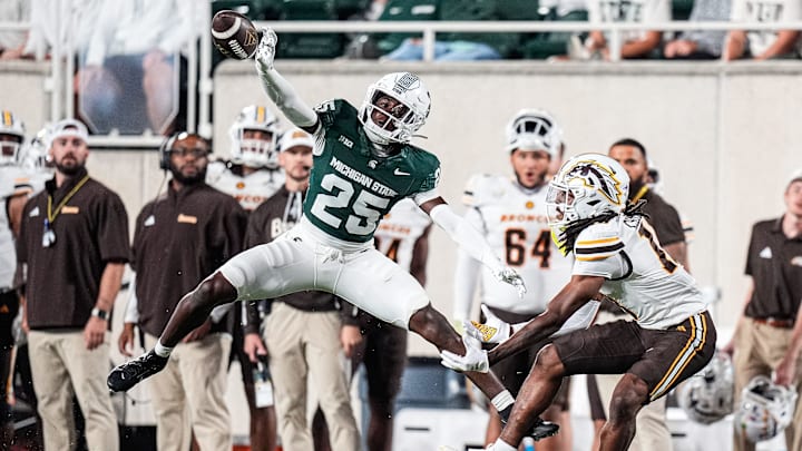 Michigan State defensive back Chance Rucker (25) blocks a pass intended for Western Michigan wide receiver Terence Marshall (11) during the second half at Spartan Stadium in East Lansing on Friday, August 29, 2025.