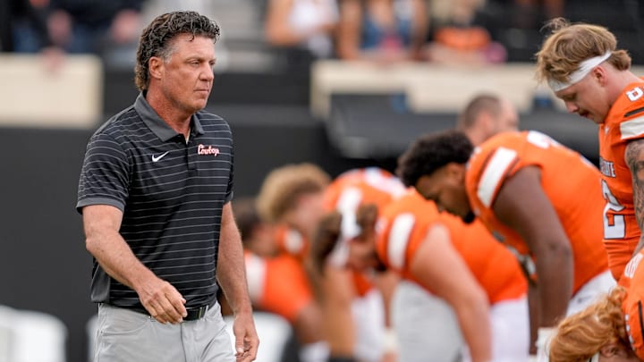 Oklahoma State Head coach Mike Gundy walks on the field before an NCAA football game between Oklahoma State (OSU) and UT Martin in Stillwater, Okla., on Thursday, Aug. 28, 2025.