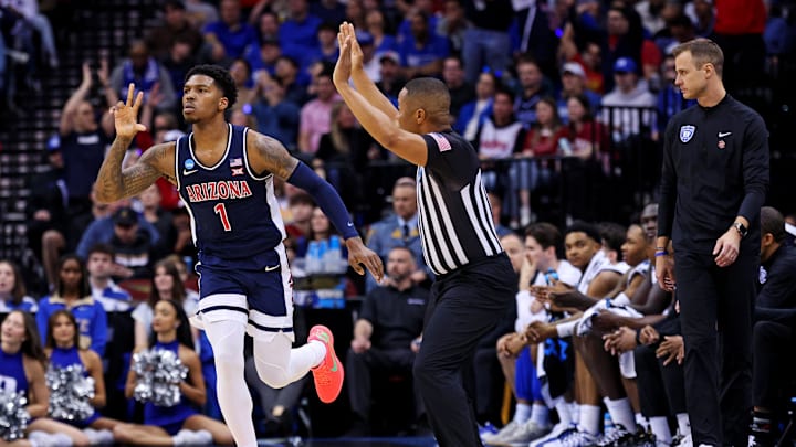 Mar 27, 2025; Newark, NJ, USA; Arizona Wildcats guard Caleb Love (1) celebrates after making a there pointer during the first half against the Duke Blue Devils during an East Regional semifinal of the 2025 NCAA tournament at Prudential Center. Mandatory Credit: Vincent Carchietta-Imagn Images