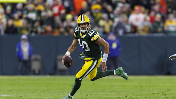 Dec 3, 2023; Green Bay, Wisconsin, USA;  Green Bay Packers quarterback Jordan Love (10) rushes with