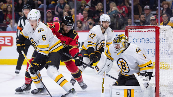Oct 27, 2025; Ottawa, Ontario, CAN; Ottawa Senators left wing Kurtis MacDermid (23) jockeys for position in front of Boston Bruins goalie Jeremy Swayman (1) in the first period at the Canadian Tire Centre. Mandatory Credit: Marc DesRosiers-IMAGN Images Oct 27, 2025; Ottawa, Ontario, CAN; Ottawa Senators left wing Kurtis MacDermid (23) jockeys for position in front of Boston Bruins goalie Jeremy Swayman (1) in the first period at the Canadian Tire Centre. Mandatory Credit: Marc DesRosiers-IMAGN Images