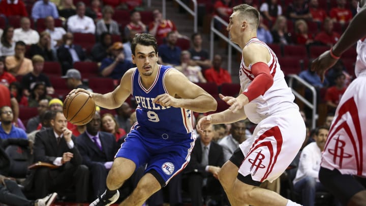 Nov 14, 2016; Houston, TX, USA; Philadelphia 76ers forward Dario Saric (9) dribbles the ball as Houston Rockets forward Sam Dekker (7) defends during the fourth quarter at Toyota Center. Mandatory Credit: Troy Taormina-USA TODAY Sports