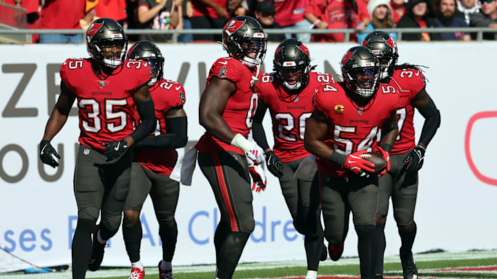Dec 8, 2024; Tampa, Florida, USA; Tampa Bay Buccaneers linebacker Lavonte David (54) celebrates after he recovered a fumble against the Las Vegas Raiders  during the second quarter at Raymond James Stadium. Mandatory Credit: Kim Klement Neitzel-Imagn Images