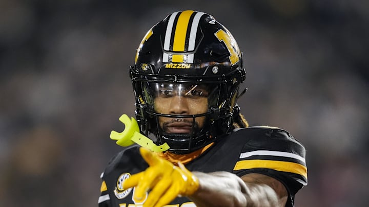 Nov 9, 2024; Columbia, Missouri, USA; Missouri Tigers wide receiver Theo Wease Jr. (1) celebrates after scoring a touchdown during the second half against the Oklahoma Sooners at Faurot Field at Memorial Stadium. Mandatory Credit: Jay Biggerstaff-Imagn Images