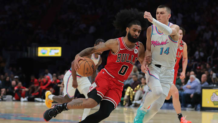 Bulls guard Coby White drives on Heat guard Tyler Herro.