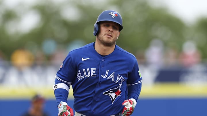 Toronto Blue Jays center fielder Daulton Varsho runs the bases.