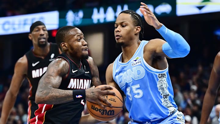 Mar 5, 2025; Cleveland, Ohio, USA; Miami Heat guard Terry Rozier (2) drives to the basket against Cleveland Cavaliers forward Isaac Okoro (35) during the first half at Rocket Arena. Mandatory Credit: Ken Blaze-Imagn Images Mar 5, 2025; Cleveland, Ohio, USA; Miami Heat guard Terry Rozier (2) drives to the basket against Cleveland Cavaliers forward Isaac Okoro (35) during the first half at Rocket Arena. Mandatory Credit: Ken Blaze-Imagn Images
