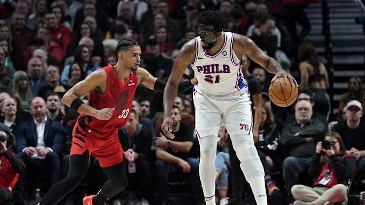 Dec 30, 2024; Portland, Oregon, USA; Philadelphia 76ers center Joel Embiid (21) handles the ball against Portland Trail Blazers forward Toumani Camara (33) during the second half at Moda Center. Mandatory Credit: Soobum Im-Imagn Images Dec 30, 2024; Portland, Oregon, USA; Philadelphia 76ers center Joel Embiid (21) handles the ball against Portland Trail Blazers forward Toumani Camara (33) during the second half at Moda Center. Mandatory Credit: Soobum Im-Imagn Images