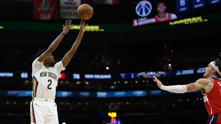 Jan 5, 2025; Washington, District of Columbia, USA; New Orleans Pelicans forward Herbert Jones (2) shoots the ball over Washington Wizards forward Corey Kispert (24) in the third quarter at Capital One Arena. Mandatory Credit: Geoff Burke-Imagn Images