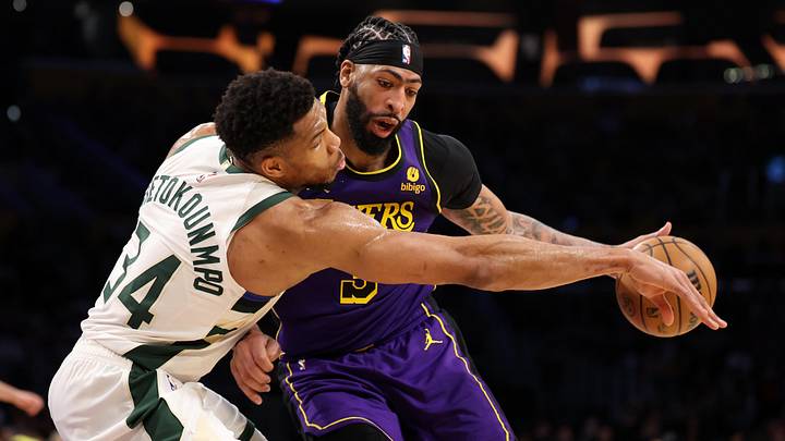 Mar 8, 2024; Los Angeles, California, USA;  Milwaukee Bucks forward Giannis Antetokounmpo (34) defends Los Angeles Lakers forward Anthony Davis (3) during the third quarter at Crypto.com Arena. Mandatory Credit: Kiyoshi Mio-Imagn Images