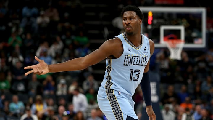 Mar 31, 2025; Memphis, Tennessee, USA; Memphis Grizzlies forward Jaren Jackson Jr. (13) reacts after a three point basket during the third quarter against the Boston Celtics at FedExForum. Mandatory Credit: Petre Thomas-Imagn Images