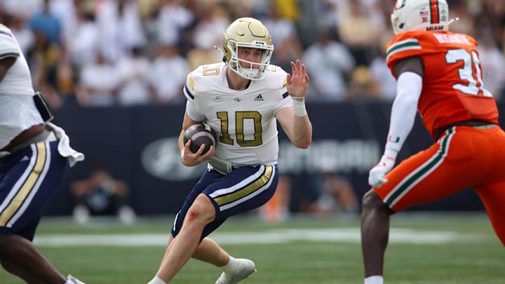 Nov 9, 2024; Atlanta, Georgia, USA; Georgia Tech Yellow Jackets quarterback Haynes King (10) runs the ball against the Miami Hurricanes in the second quarter at Bobby Dodd Stadium at Hyundai Field. Mandatory Credit: Brett Davis-Imagn Images
