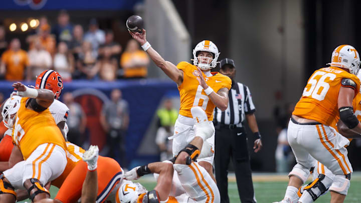 Aug 30, 2025; Atlanta, Georgia, USA; Tennessee Volunteers quarterback Joey Aguilar (6) throws a pass against the Syracuse Orange in the first quarter at Mercedes-Benz Stadium. Mandatory Credit: Brett Davis-Imagn Images
Aug 30, 2025; Atlanta, Georgia, USA; Tennessee Volunteers quarterback Joey Aguilar (6) throws a pass against the Syracuse Orange in the first quarter at Mercedes-Benz Stadium. Mandatory Credit: Brett Davis-Imagn Images