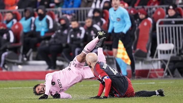 Toronto FC midfielder Michael Bradley upends Inter Miami striker Coco Jean in the teams' MLS Eastern Conference match Saturday. The Reds won 2-0.