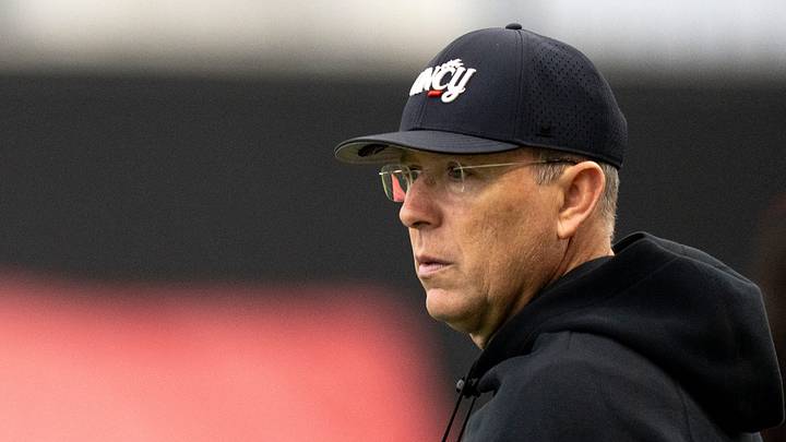 Cincinnati Bearcats head coach Scott Satterfield looks on during football practice at Sheakley Athletic Performance Center in Cincinnati on Dec. 18, 2025. Cincinnati Bearcats head coach Scott Satterfield looks on during football practice at Sheakley Athletic Performance Center in Cincinnati on Dec. 18, 2025.