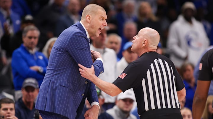 Dec 20, 2025; Atlanta, Georgia, USA; Kentucky Wildcats head coach Mark Pope talks to a referee against the St. John Red Storm in the first half at State Farm Arena. Mandatory Credit: Brett Davis-Imagn Images
