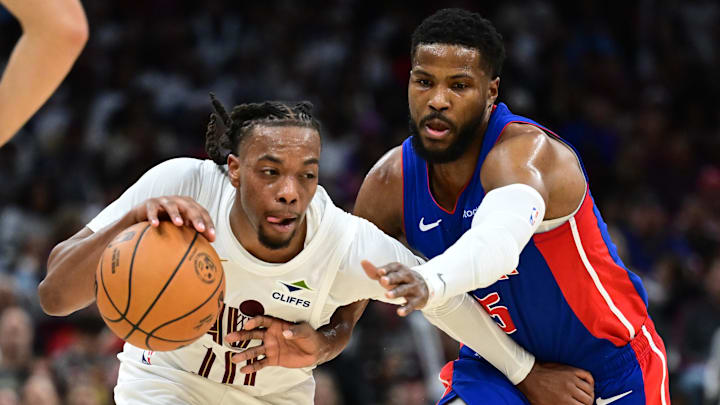 Oct 25, 2024; Cleveland, Ohio, USA; Cleveland Cavaliers guard Darius Garland (10) drives to the basket against Detroit Pistons guard Marcus Sasser (25) during the second half at Rocket Mortgage FieldHouse. Mandatory Credit: Ken Blaze-Imagn Images