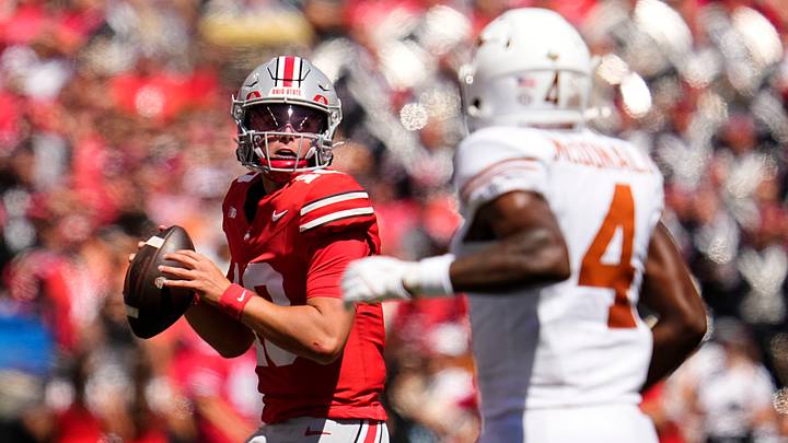 Ohio State Buckeyes quarterback Julian Sayin (10) looks to pass over Texas Longhorns defensive back Jelani McDonald (4) during the NCAA football game at Ohio Stadium on Aug. 30, 2025.