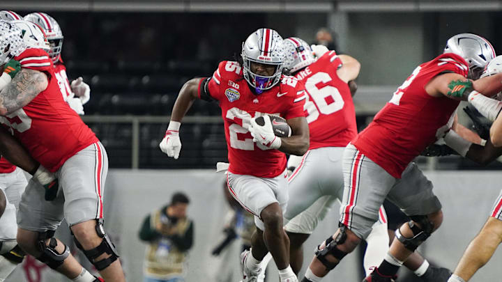 Dec 31, 2025; Arlington, TX, USA; Ohio State Buckeyes running back Bo Jackson (25) runs the ball in the third quarter against the Miami Hurricanes during the 2025 Cotton Bowl and quarterfinal game of the College Football Playoff at AT&T Stadium. Mandatory Credit: Raymond Carlin III-Imagn Images