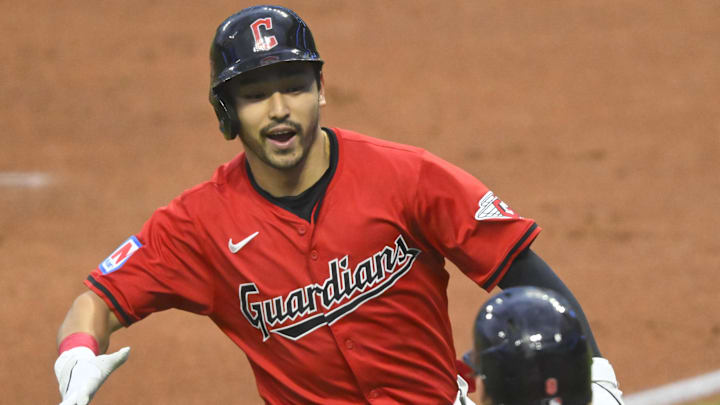 Sep 25, 2024; Cleveland, Ohio, USA; Cleveland Guardians left fielder Steven Kwan (38) celebrates his solo home run with designated hitter Kyle Manzardo (9) in the first inning against the Cincinnati Reds at Progressive Field. Mandatory Credit: David Richard-Imagn Images