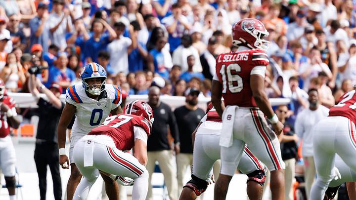 Oct 10, 2026; Gainesville, Florida, USA; Florida Gators jack Jayden Woods (0) looks at South Carolina Gamecocks quarterback LaNorris Sellers (16) during the second half at Ben Hill Griffin Stadium. Mandatory Credit: Matt Pendleton-Imagn Images Oct 10, 2026; Gainesville, Florida, USA; Florida Gators jack Jayden Woods (0) looks at South Carolina Gamecocks quarterback LaNorris Sellers (16) during the second half at Ben Hill Griffin Stadium. Mandatory Credit: Matt Pendleton-Imagn Images