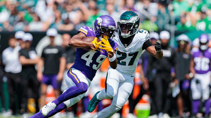 Aug 24, 2024; Philadelphia, Pennsylvania, USA; Minnesota Vikings wide receiver Justin Hall (49) runs the ball against Philadelphia Eagles cornerback Zech McPhearson (27) during the second quarter at Lincoln Financial Field. Aug 24, 2024; Philadelphia, Pennsylvania, USA; Minnesota Vikings wide receiver Justin Hall (49) runs the ball against Philadelphia Eagles cornerback Zech McPhearson (27) during the second quarter at Lincoln Financial Field.