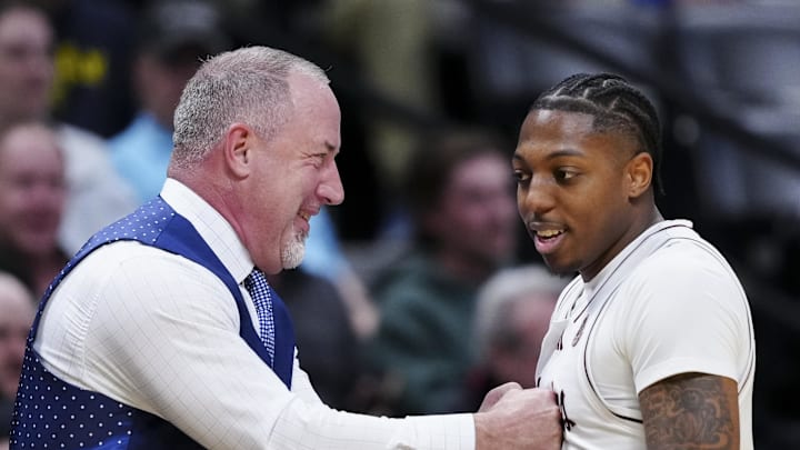 Texas A&M Aggies head coach Buzz Williams and guard Wade Taylor IV (4) reacts after the win over Yale Bulldogs at Ball Arena. Texas A&M Aggies head coach Buzz Williams and guard Wade Taylor IV (4) reacts after the win over Yale Bulldogs at Ball Arena.