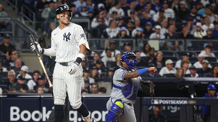 Oct 5, 2024; Bronx, New York, USA; New York Yankees outfielder Aaron Judge (99) reacts after striking out during the eighth inning against the Kansas City Royals during game one of the ALDS for the 2024 MLB Playoffs at Yankee Stadium. Mandatory Credit: Vincent Carchietta-Imagn Images