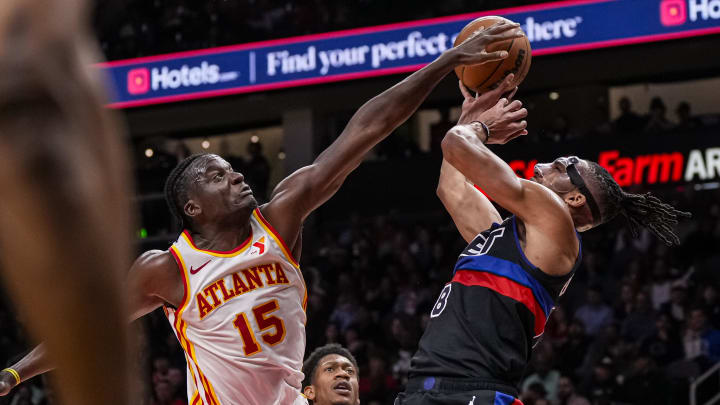 Apr 3, 2024; Atlanta, Georgia, USA; Detroit Pistons forward Tosan Evbuomwan (18) has his shot