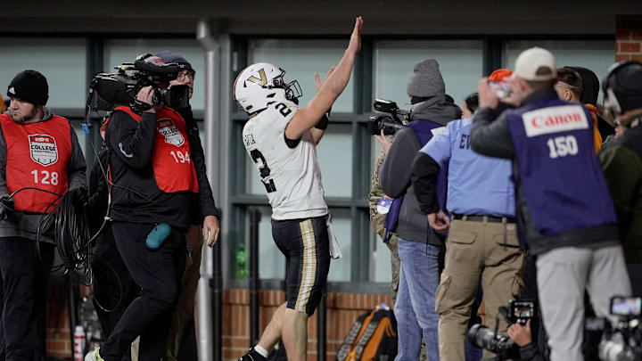Vanderbilt quarterback Diego Pavia (2) celebrates after scoring a touchdown against Tennessee during the fourth quarter at Neyland Stadium in Knoxville, Tenn., Saturday, Nov. 29, 2025.