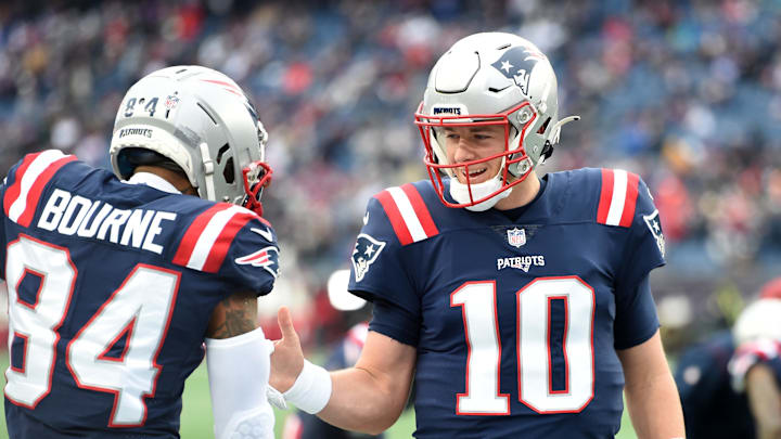New England Patriots wide receiver Kendrick Bourne (84) and quarterback Mac Jones (10)