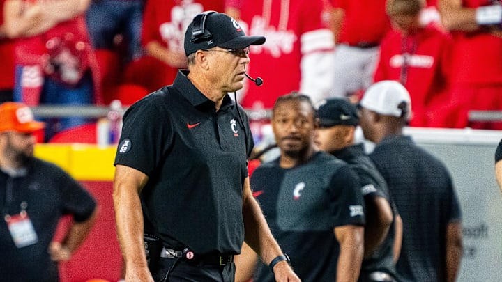 Aug 28, 2025; Kansas City, Missouri, USA; Cincinnati Bearcats head coach Scott Satterfield during the fourth quarter against the Nebraska Cornhuskers at GEHA Field at Arrowhead Stadium. Mandatory Credit: Dylan Widger-Imagn Images