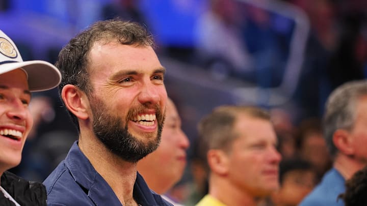 Jan 5, 2025; San Francisco, California, USA; Retired NFL quarter Andrew Luck smiles court side during the fourth quarter of the game between the Golden State Warriors and Sacramento Kings at Chase Center. Mandatory Credit: Kelley L Cox-Imagn Images Jan 5, 2025; San Francisco, California, USA; Retired NFL quarter Andrew Luck smiles court side during the fourth quarter of the game between the Golden State Warriors and Sacramento Kings at Chase Center. Mandatory Credit: Kelley L Cox-Imagn Images