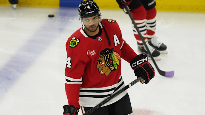 Chicago Blackhawks defenseman Seth Jones warms up before a game against the Minnesota Wild at United Center.