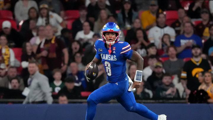 Sep 19, 2026; London, ENG; Kansas Jayhawks quarterback Isaiah Marshall (8) runs with the ball against the Arizona State Sun Devils during the second half at Wembley Stadium. Mandatory Credit: Peter van den Berg-Imagn Images Sep 19, 2026; London, ENG; Kansas Jayhawks quarterback Isaiah Marshall (8) runs with the ball against the Arizona State Sun Devils during the second half at Wembley Stadium. Mandatory Credit: Peter van den Berg-Imagn Images