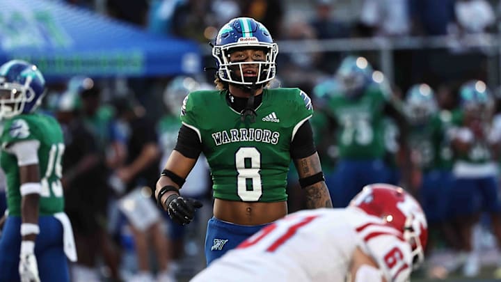 Winton Woods lineman Justin Hill (8) is in action during the Warriors 19-5 win over Kings Friday Aug 30, 2024.