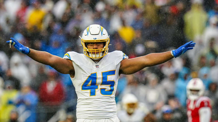 Dec 3, 2023; Foxborough, Massachusetts, USA; Los Angeles Chargers linebacker Tuli Tuipulotu (45) reacts after stoping the first down against the New England Patriots in the second quarter at Gillette Stadium. Mandatory Credit: David Butler II-USA TODAY Sports Dec 3, 2023; Foxborough, Massachusetts, USA; Los Angeles Chargers linebacker Tuli Tuipulotu (45) reacts after stoping the first down against the New England Patriots in the second quarter at Gillette Stadium. Mandatory Credit: David Butler II-USA TODAY Sports