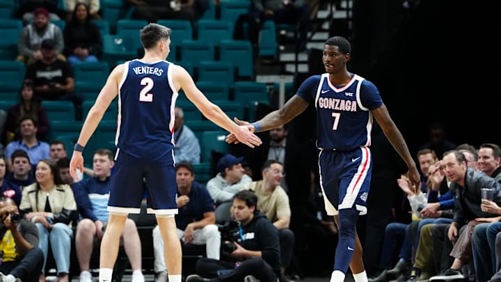 Nov 24, 2025; Las Vegas, Nevada, USA; Gonzaga Bulldogs guard Tyon Grant-Foster (7) and forward Steele Venters (2) react during the first half against the Alabama Crimson Tide in a 2025 Players Era Festival group play game at MGM Grand Garden Arena. 
