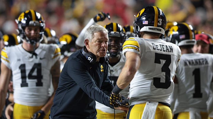 Sep 24, 2022; Piscataway, New Jersey, USA; Iowa Hawkeyes defensive back Cooper DeJean (3) is congratulated by head coach Kirk Ferentz after an interception for a touchdown during the first half against the Rutgers Scarlet Knights at SHI Stadium. Mandatory Credit: Vincent Carchietta-Imagn Images